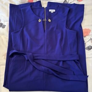 Calvin Klein jumpsuit. Violet with gold accent zipper.